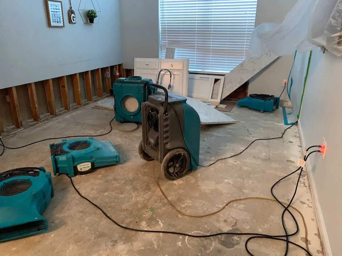 Dehumidifier in flood-cut room for Water Damage Restoration in Liberty Triangle